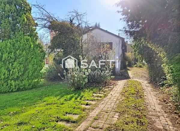 Terrain de 1860m2 avec maison à rénover