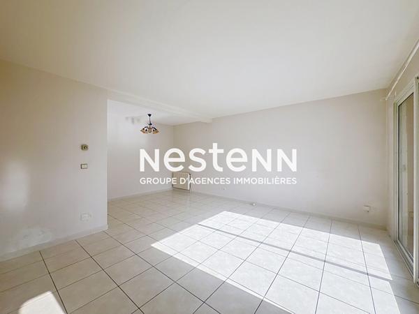 A vendre : Appartement spacieux de 4 pieces a Perpignan, secteur Kennedy, balcons et place de parking.