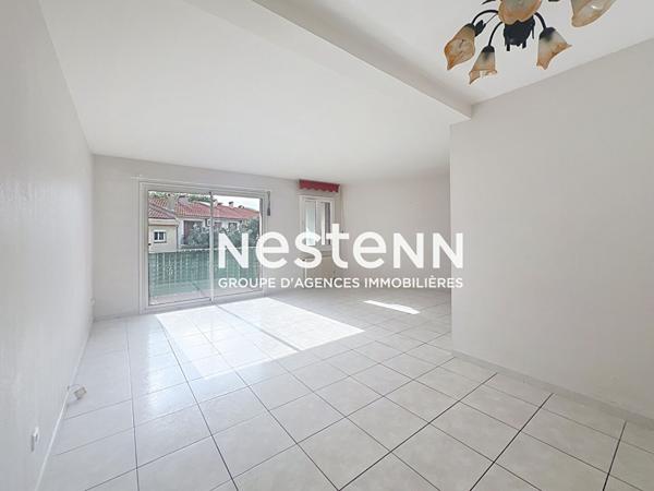 A vendre : Appartement spacieux de 4 pieces a Perpignan, secteur Kennedy, balcons et place de parking.
