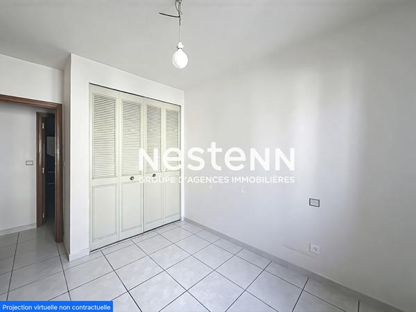 A vendre : Appartement spacieux de 4 pieces a Perpignan, secteur Kennedy, balcons et place de parking.