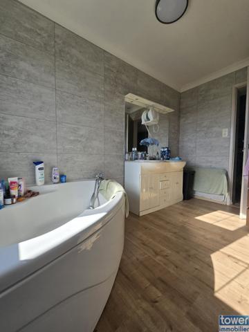 Maison semi-individuelle avec jardin, garage et 3 chambres – DPE B