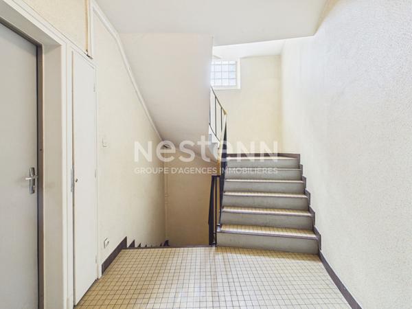 Aurillac, rue des Carmes, à Vendre Immeuble de 6 appartements et un local commercial.