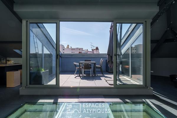 Hôtel particulier en coeur de ville et sa terrasse sur les toits