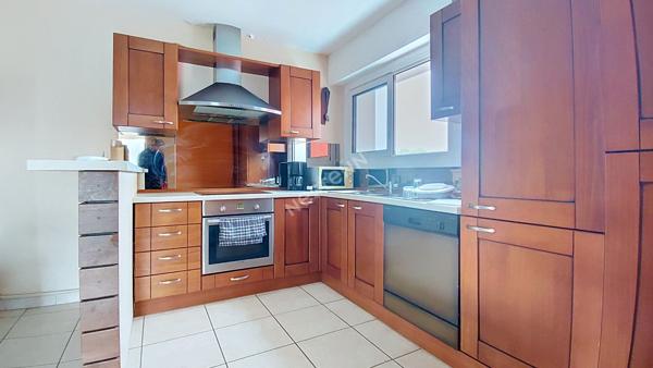 SAINT-HERBLAIN - AVENUE DE LA BOUVARDIÈRE / Appartement 100m² 4 pièces 3 chambres, balcon, parking extérieur et cave
