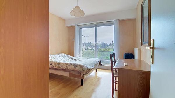 SAINT-HERBLAIN - AVENUE DE LA BOUVARDIÈRE / Appartement 100m² 4 pièces 3 chambres, balcon, parking extérieur et cave