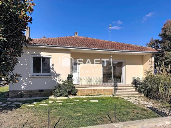 Maison familiale de 98 m² avec jardin arboré.