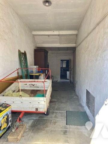 Maison de bourg de 105.15 m2 de plain pied comprend une cuisine, salle à manger, séjour, salon,...