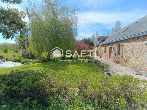 Propriété avec maison en pierre et dépendances