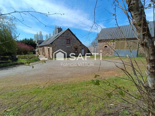 Propriété avec maison en pierre et dépendances