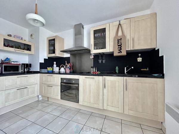 Magnifique appartement avec deux places  de parking privatives.