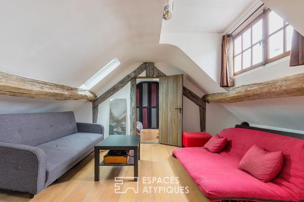 Dernier étage suspendu sous les toits