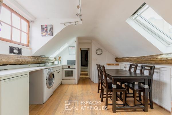 Dernier étage suspendu sous les toits