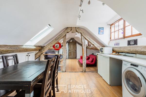 Dernier étage suspendu sous les toits