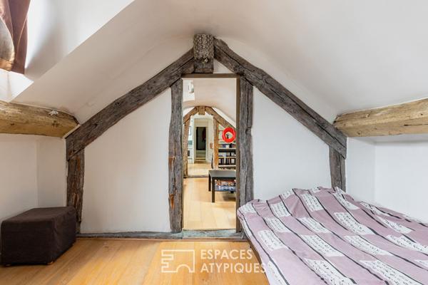 Dernier étage suspendu sous les toits