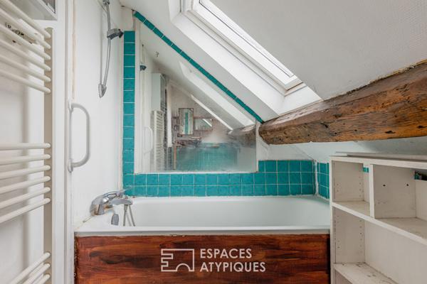 Dernier étage suspendu sous les toits