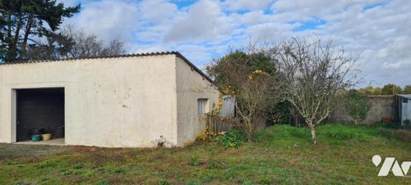 Maison d'habitation de plain-pied 118 m² dépendances garage 3 chambres véranda 
