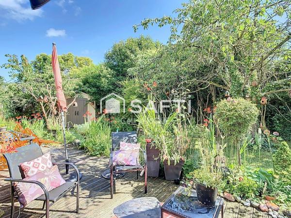 Maison 5 pièces avec jardin et garage dans bel environnement