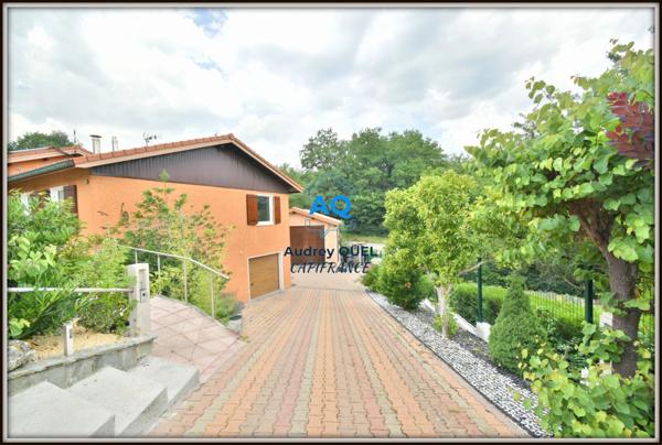 Maison de plain-pied à vendre - 6 pièces - 134 m² habitables (253 m² total) - Terrain 1098 m² - VALSERHONE (01)