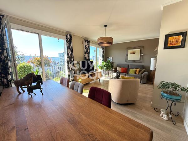 Appartement lumineux avec balcon, garage et parking quartier Saint-Claude