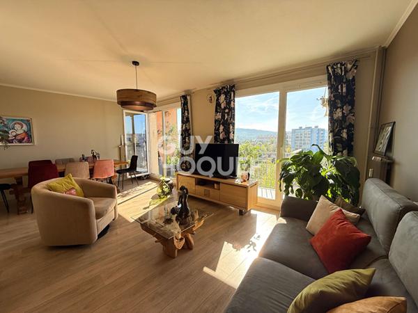 Appartement lumineux avec balcon, garage et parking quartier Saint-Claude