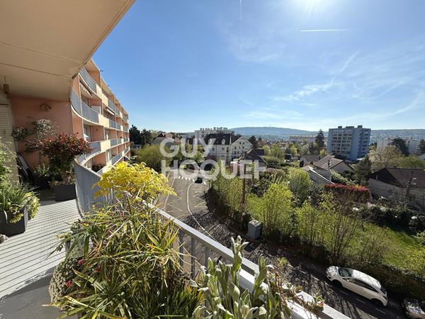 Appartement lumineux avec balcon, garage et parking quartier Saint-Claude