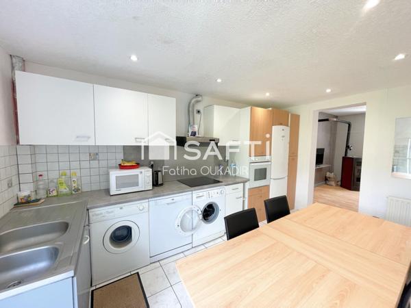 Appartement au calme avec cave et jardin privatif