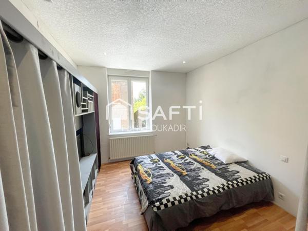 Appartement au calme avec cave et jardin privatif