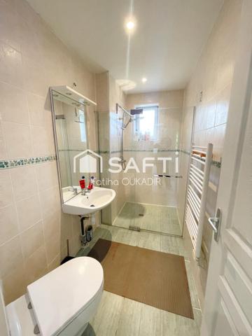 Appartement au calme avec cave et jardin privatif