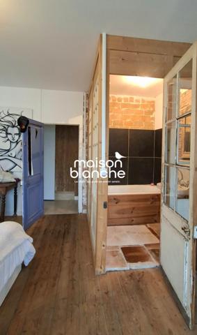 Murs commerciaux avec logement T4 avec terrasse