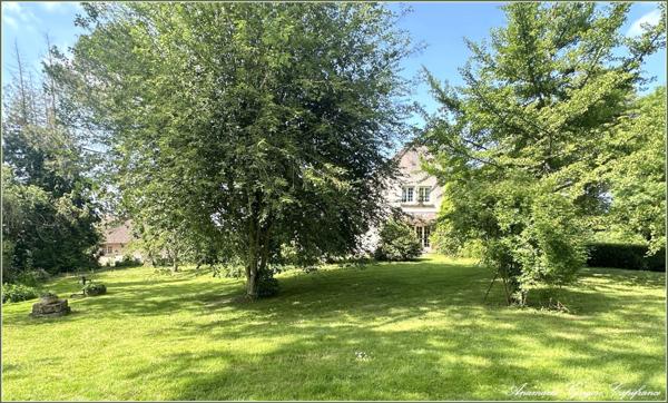 Courville-sur-Eure Maison familiale de 155 m², terrain arboré de 8317 m². Cadre exceptionnel et fort potentiel !