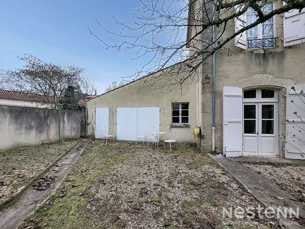 A Vendre Maison en pierre de 144 m² avec jardin et garage au coeur de Condom