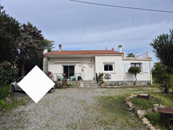 Très belle maison de 118m2 avec dépendance à rénover et abri de jardin sise sur un terrain arboré d'environ 3000m2.