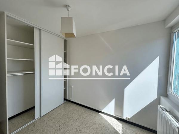 Location Appartement 4 pièces 76.8 m² - 33 RUE LAVASTRE Nimes 30000