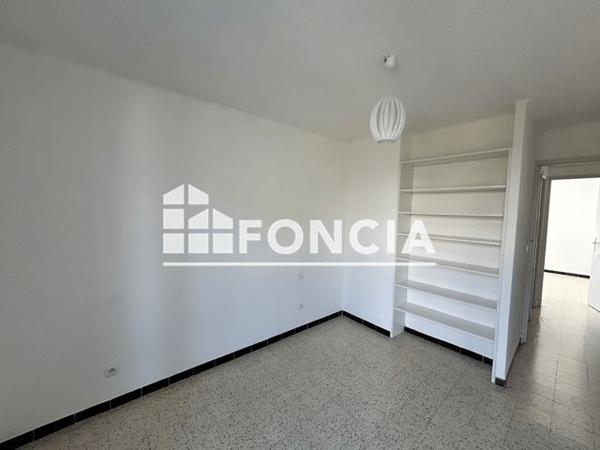 Location Appartement 4 pièces 76.8 m² - 33 RUE LAVASTRE Nimes 30000