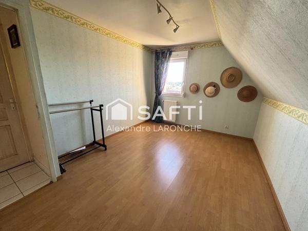 Maison idéalement située, avec une vue dégagée, et proche des commerces