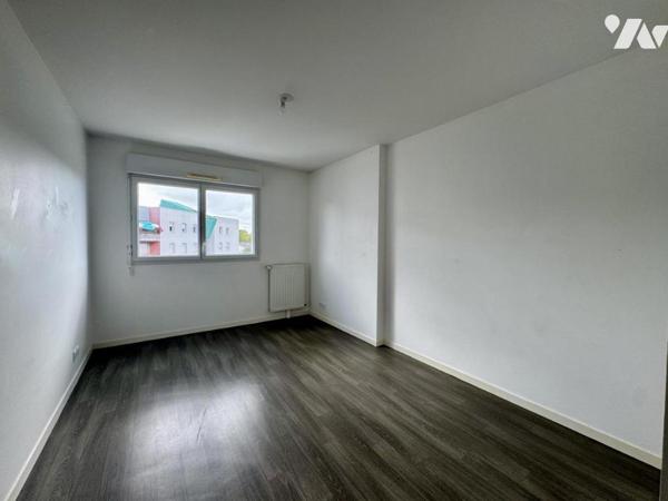 A VENDRE - Appartement 2 chambres - 2 places de parking - balcon