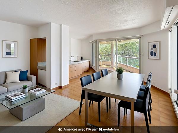 APPARTEMENT 2/3 PIECES 75 m² AVEC TERRASSE, CAVE ET GARAGE