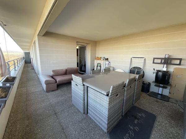 L'Isle-d'Abeau (38080) À L'Isle-D'Abeau, appartement T3 avec grande terrasse ainsi que deux places de parkings