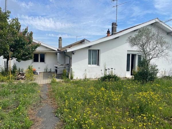 Maison 90m², 4 chambres, grand garage, terrain 582m²