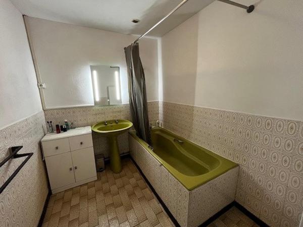 Maison 90m², 4 chambres, grand garage, terrain 582m²