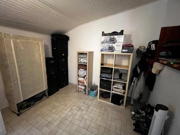 Maison 90m², 4 chambres, grand garage, terrain 582m²