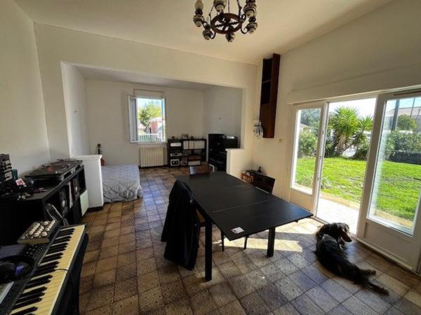 Maison 90m², 4 chambres, grand garage, terrain 582m²