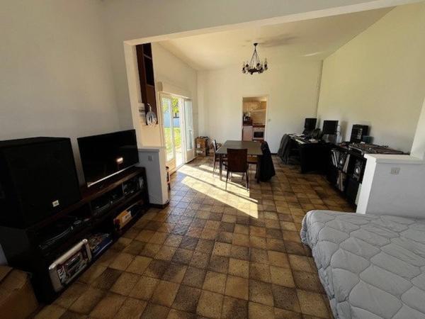 Maison 90m², 4 chambres, grand garage, terrain 582m²