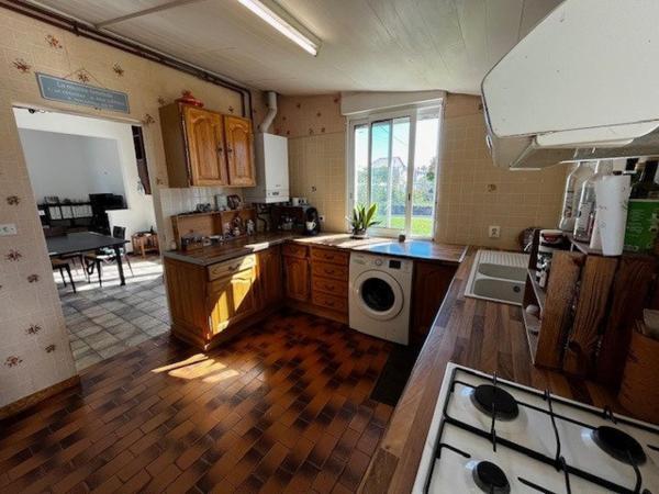 Maison 90m², 4 chambres, grand garage, terrain 582m²