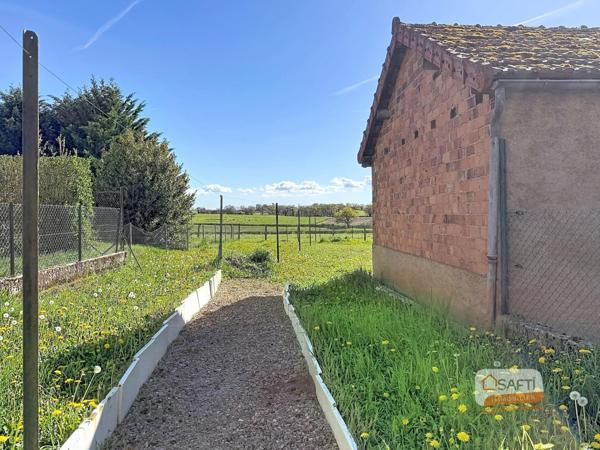 Maison de village avec jardin et dépendances