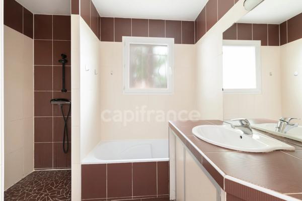 A pied de tout · plain pied de 107 m² · 4 chambres