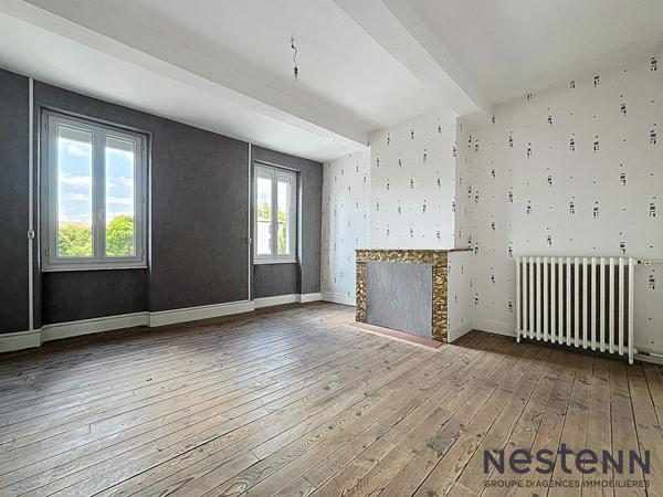 Maison de ville avec jardin attenant