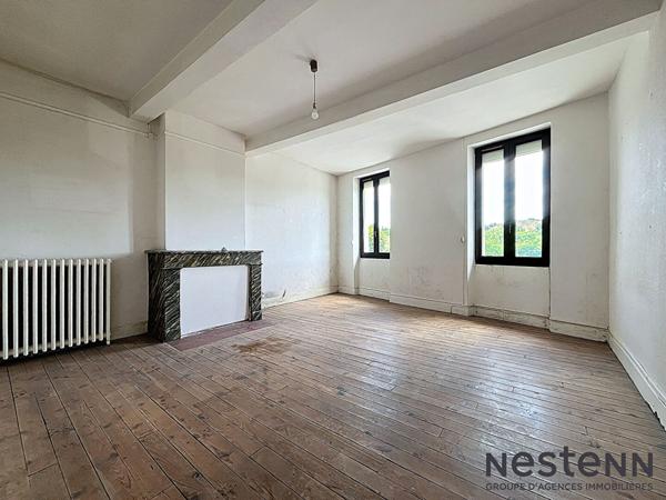 Maison de ville avec jardin attenant