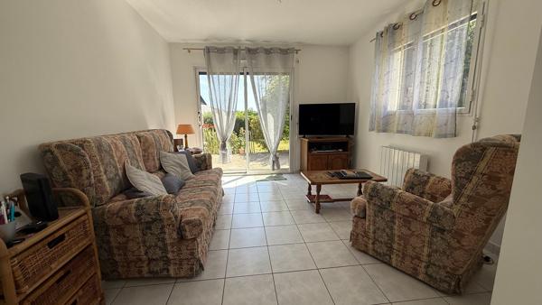Emplacement idéal pour cette maison familiale proche du centre-bourg