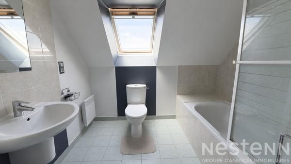 Emplacement idéal pour cette maison familiale proche du centre-bourg